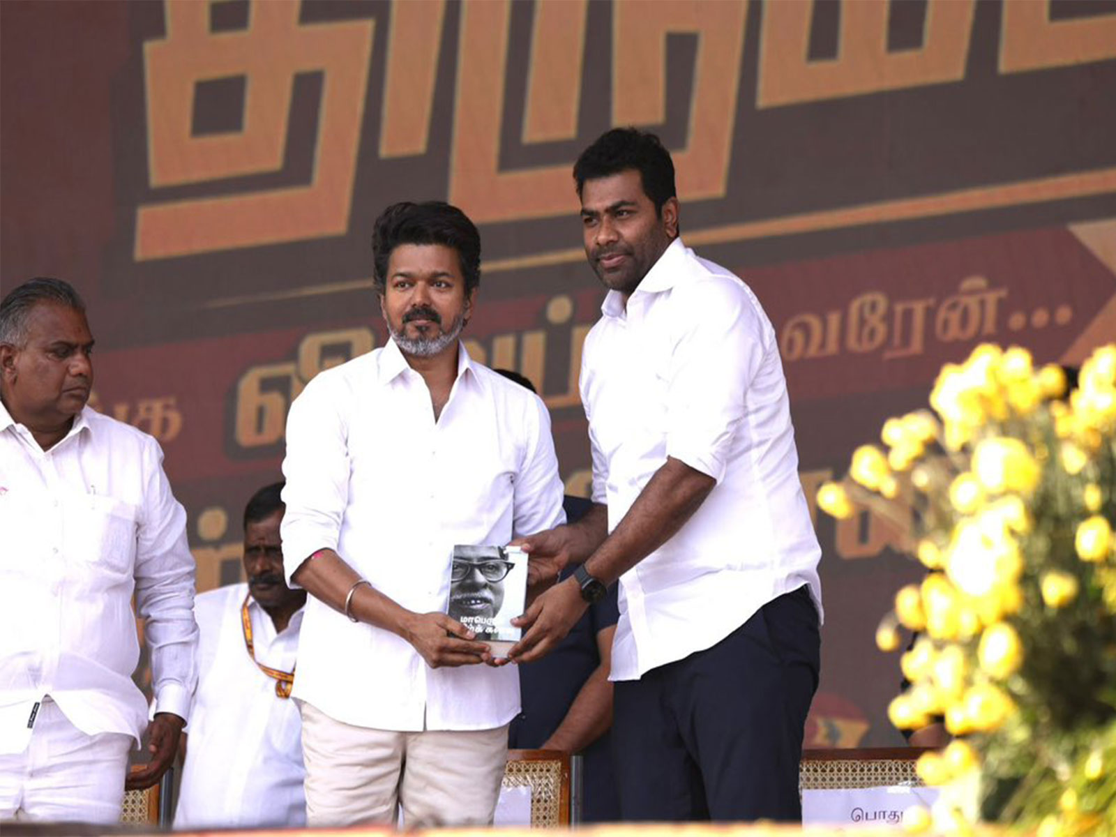 TVK leader Aadhav Arjun with party founder Vijay (Photo/X/@AadhavArjuna)