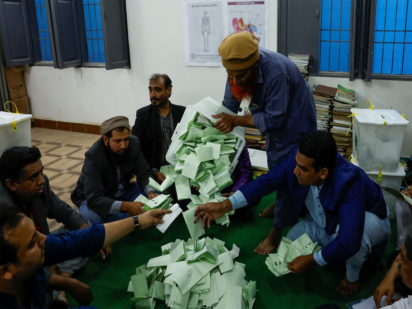 Election officials count ballots after polling in Pakistan's 2024 general elections (File Photo/Reuters)