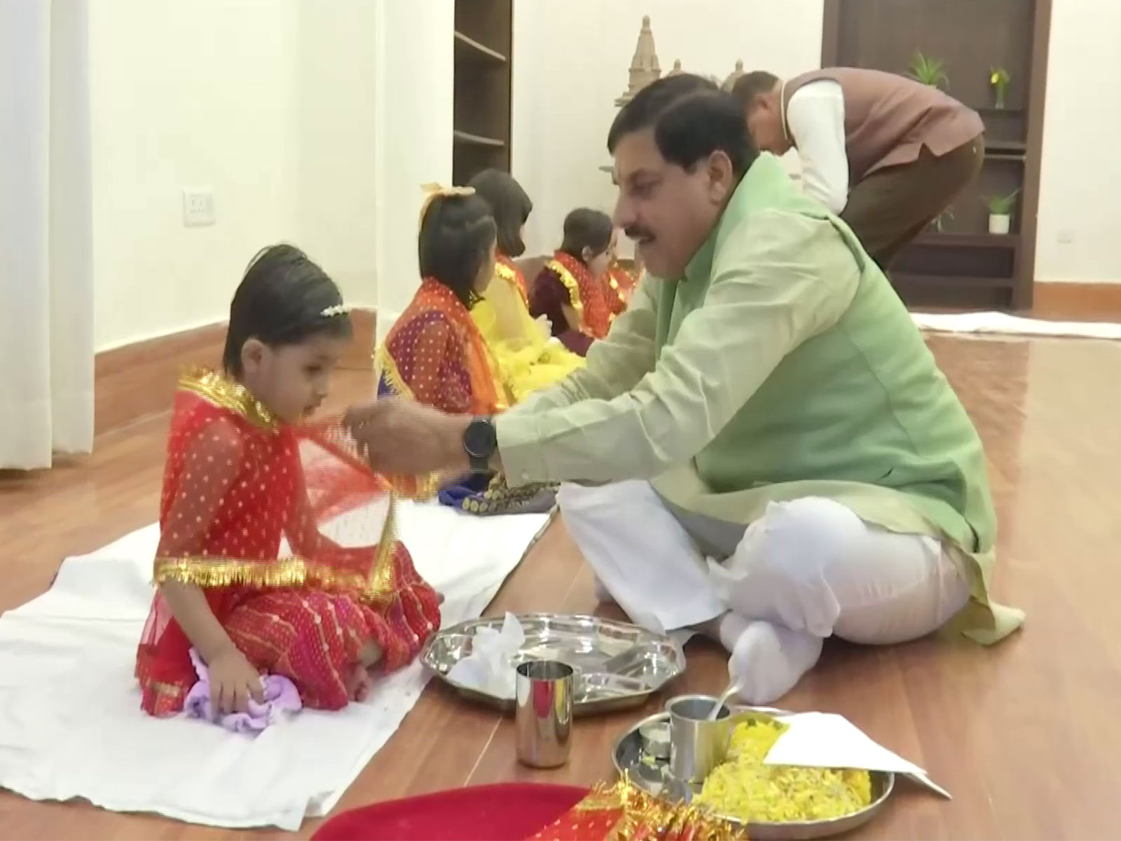 MP CM Mohan Yadav drapping Chunari to girl during Kanya Pujan (Photo/ANI)