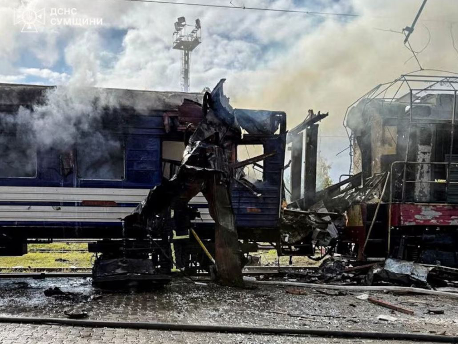 Smoke rises over a passenger train hit by Russian drone strike (Photo/Reuters)