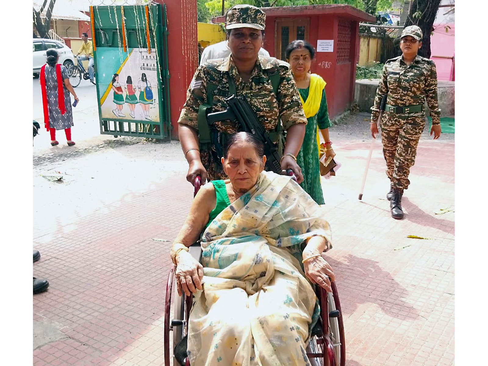 CAPF personnel helping PwD elector reach polling station (File Photo/ANI)