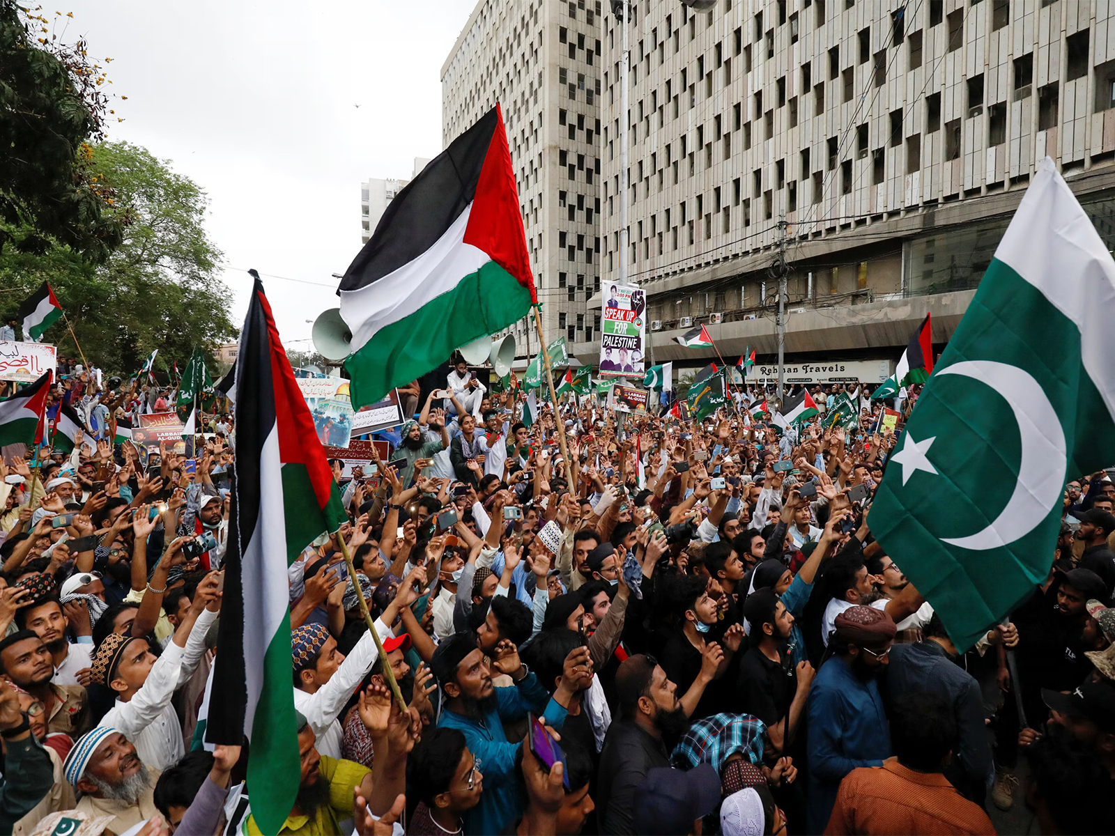People carry flags and chant slogans during a rally in Karachi to express solidarity with Palestinians and protest against Israel's actions in Gaza (File Photo/Reuters)