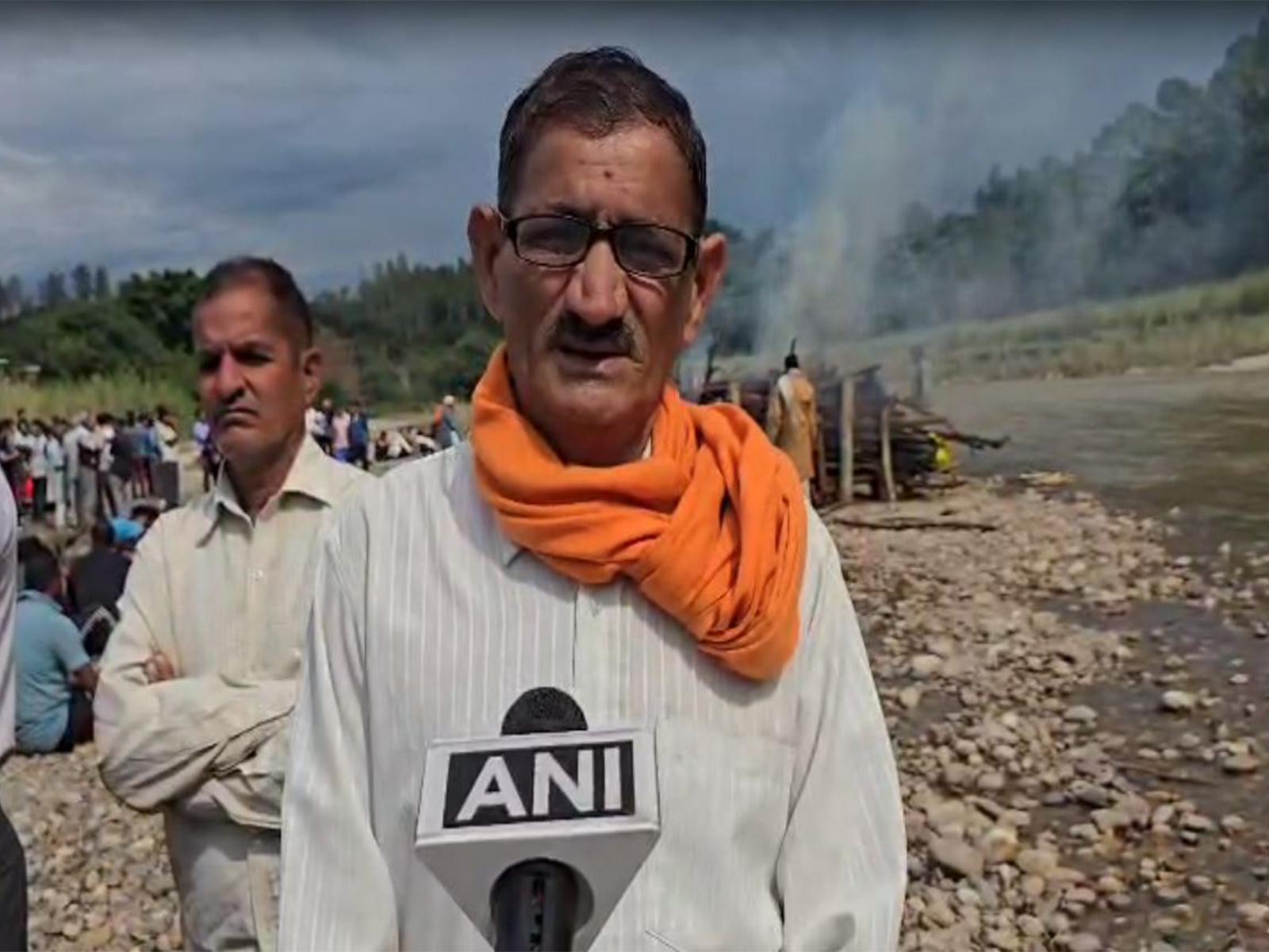 A resident of the village where the last rites of four members of a family, who died in the bus accident, were performed on Wednesday   (Photo/ANI)