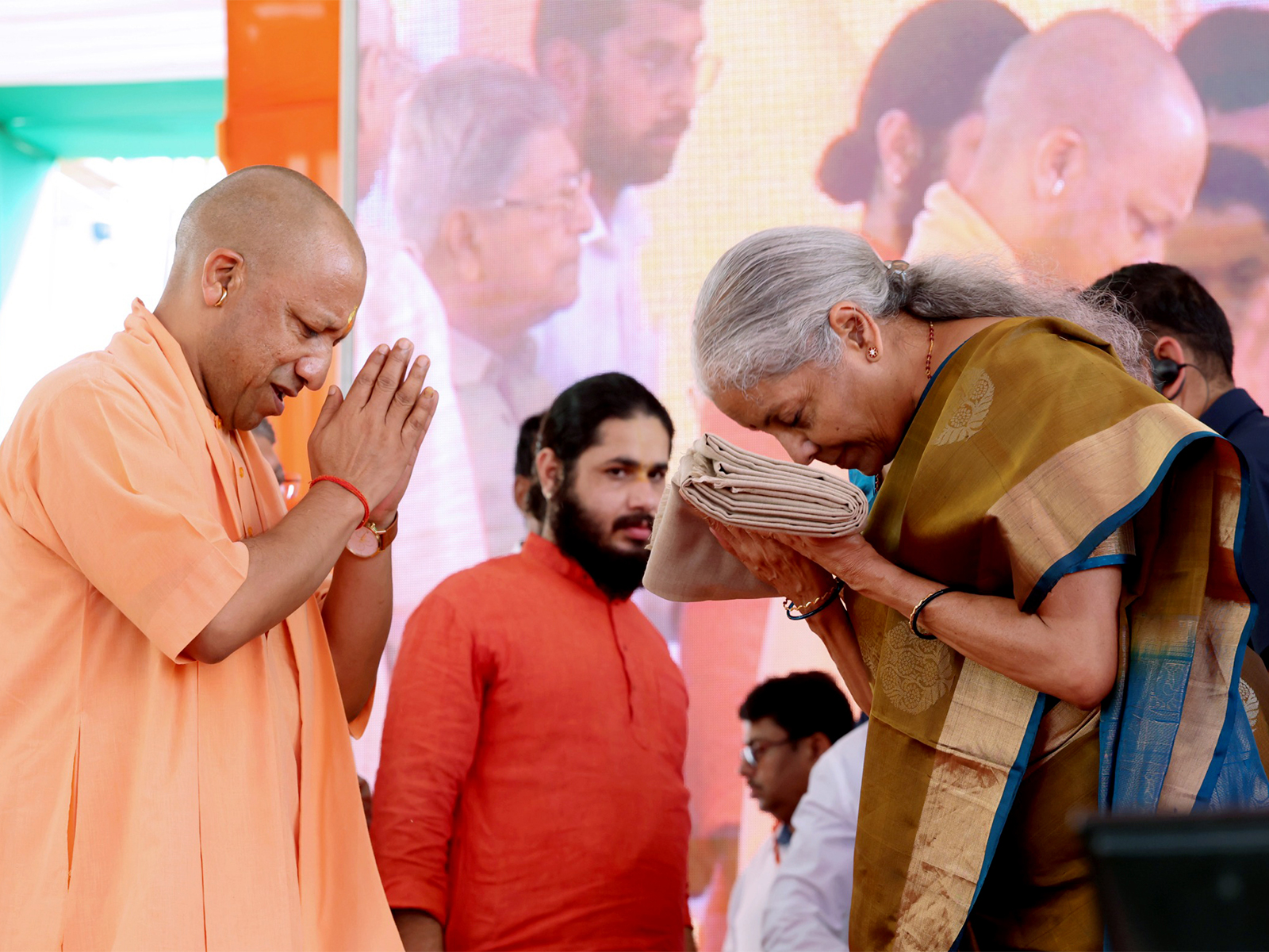 Uttar Pradesh CM Yogi Adityanath and Union Minister Nirmala Sitharaman at the statue unveiling ceremony in Ayodhya (Photo/ANI)