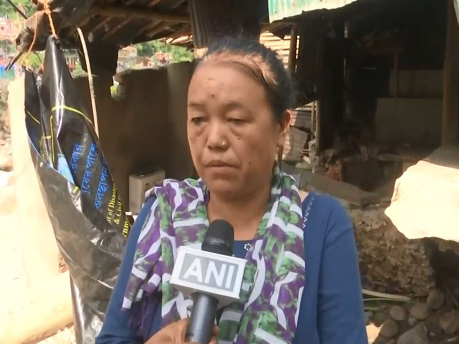 A local highlights challenges after a bridge collapsed following heavyrain in Darjeeling, West Bengal. (Photo/ANI)