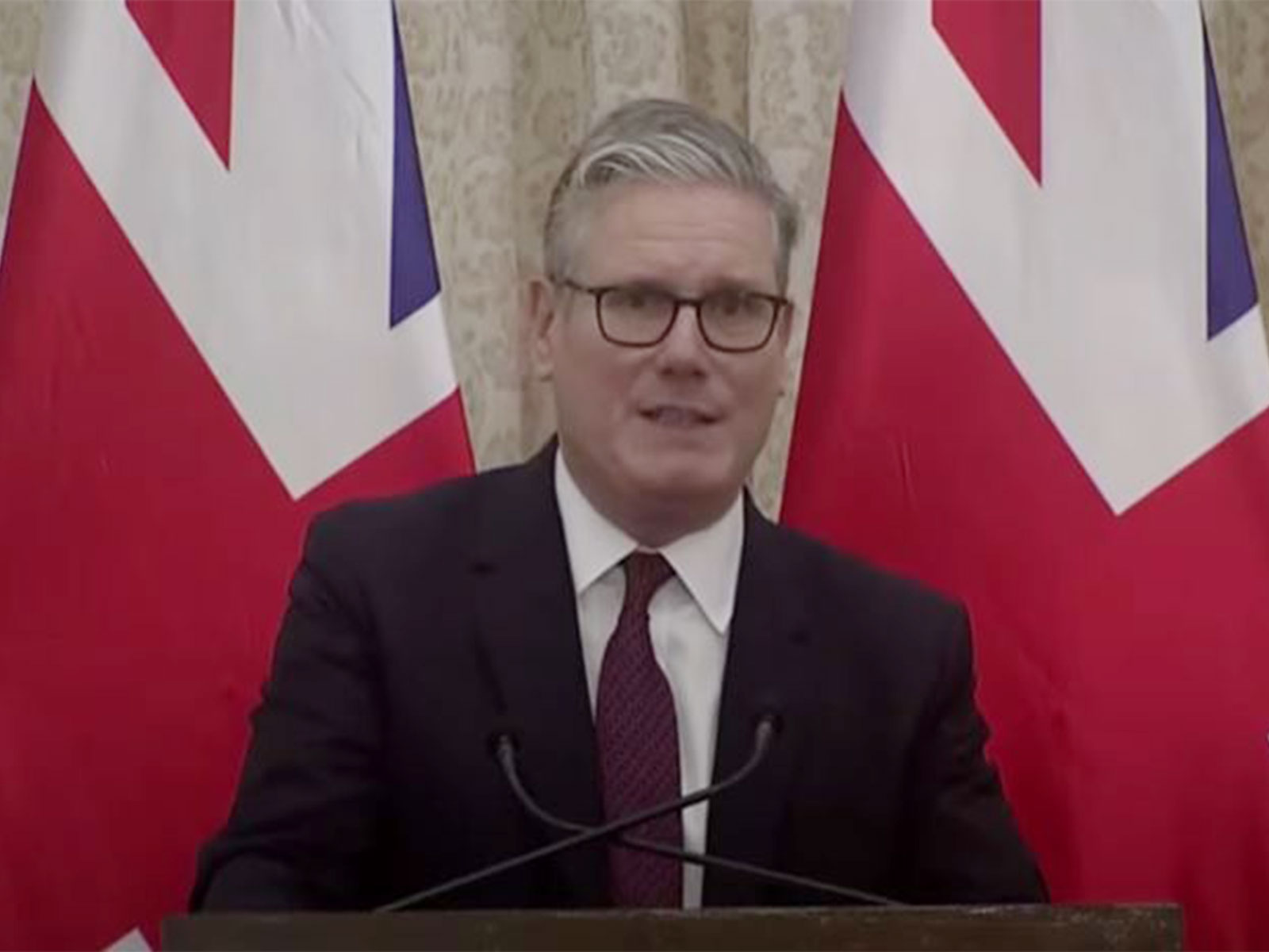 UK PM Keir Starmer addressing media during his visit to India (Photo/ YouTube @MEA India)
