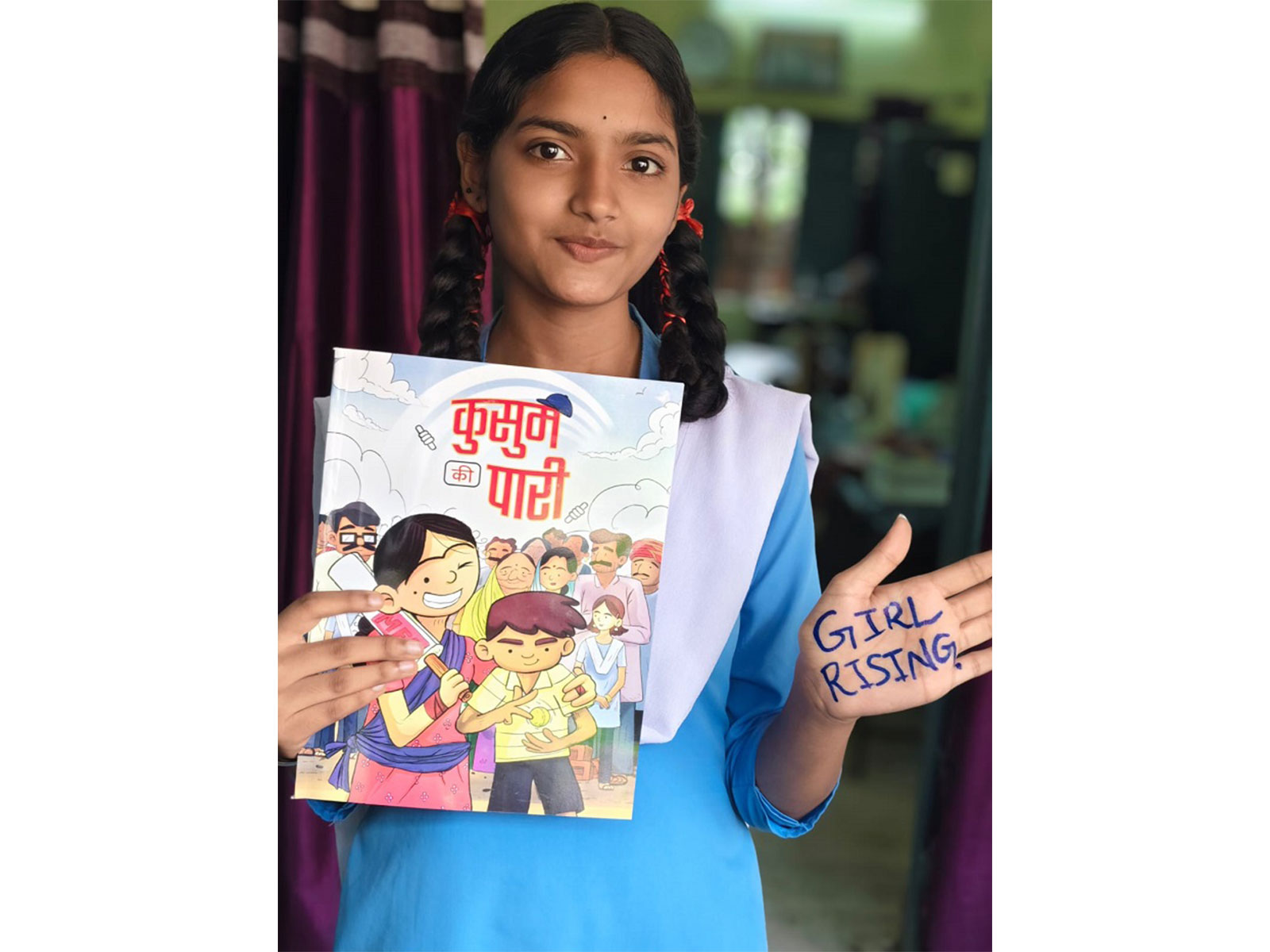 A Girl Reading Girl Rising Comic Book on Kusum's Adventurous Innings