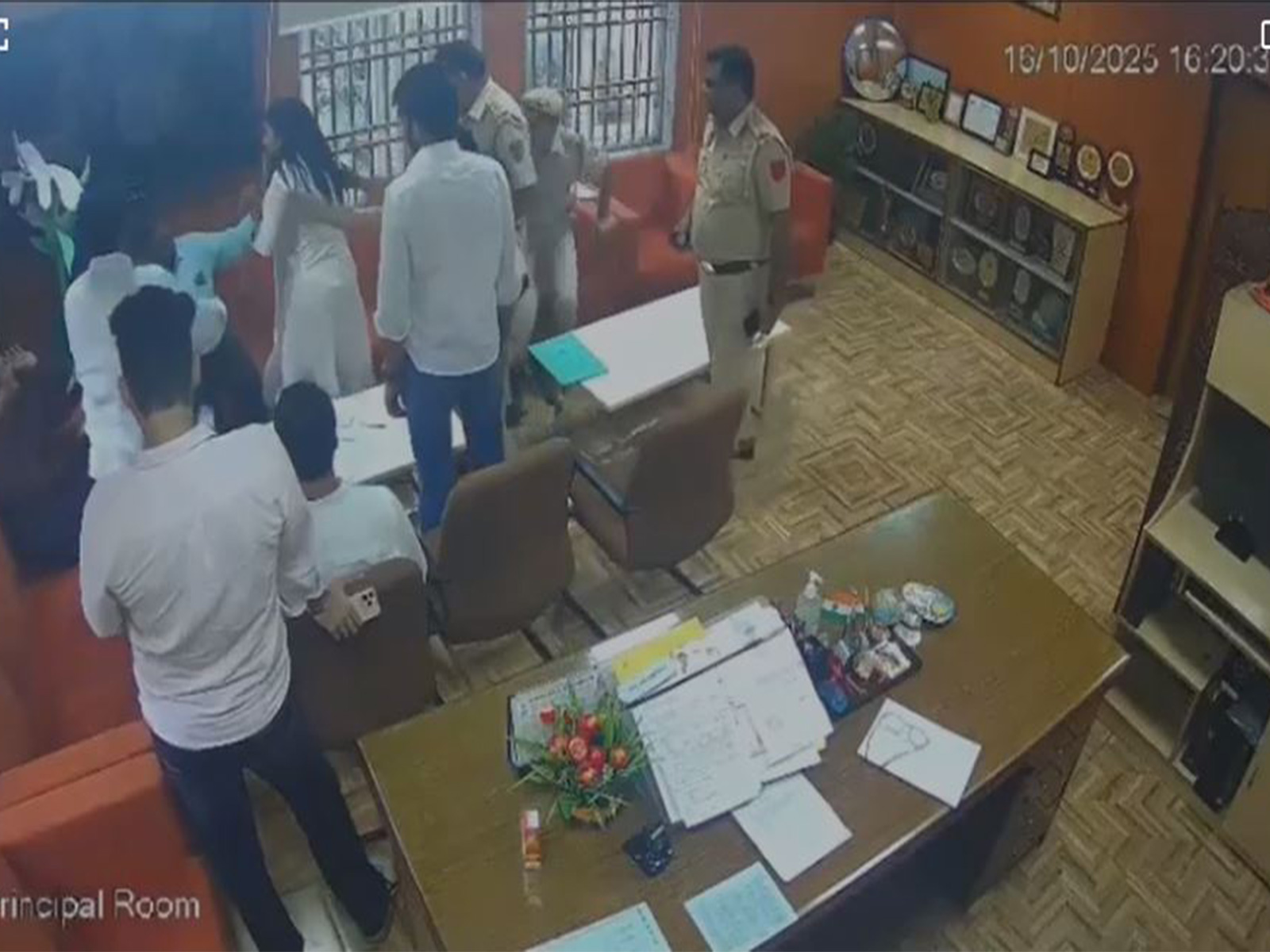 CCTV still of DUSU Joint Secretary Deepika Jha slapping Professor Sujit Kumar (Photo/Ambedkar College) 