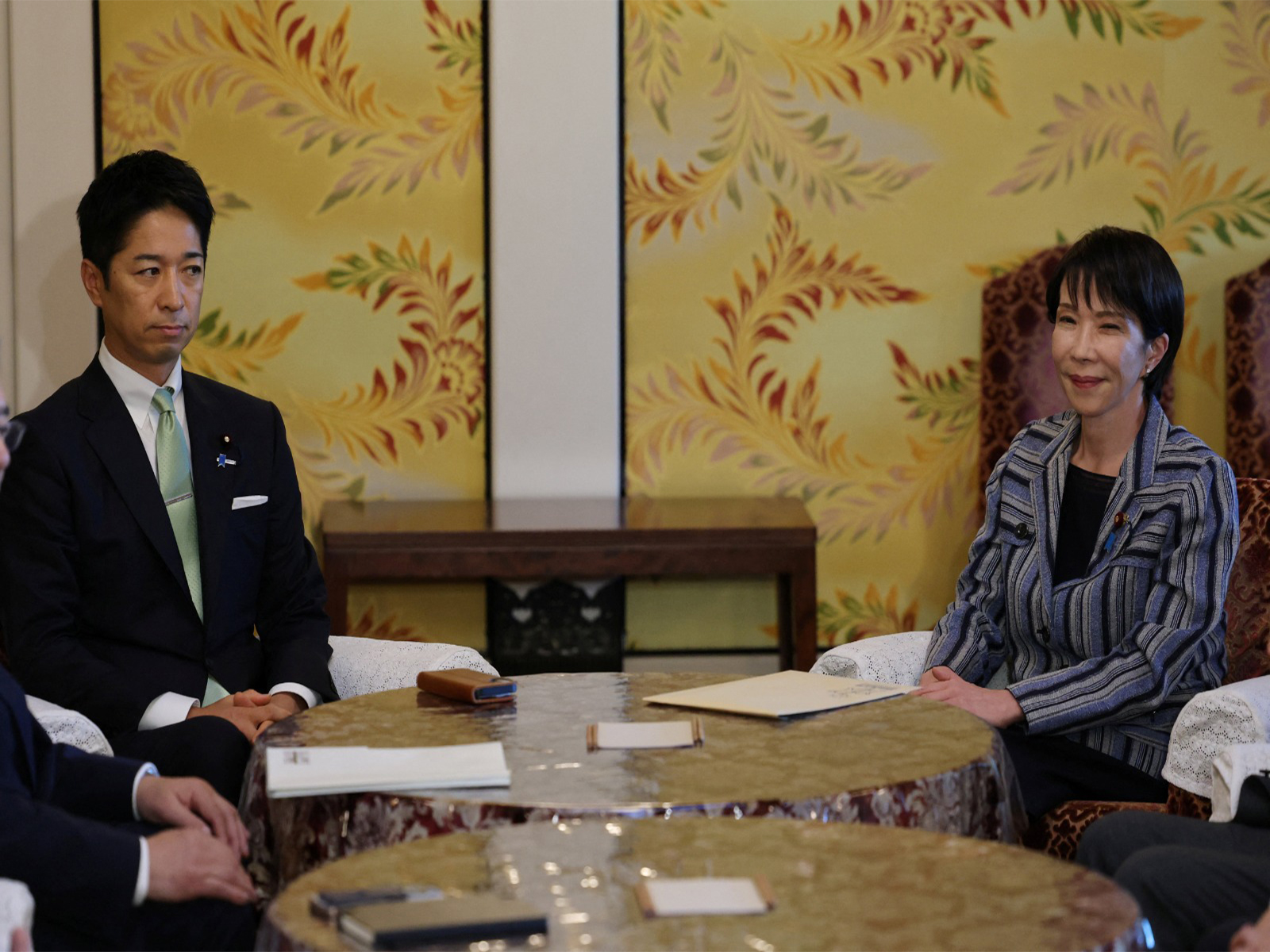 Leader of Japan's ruling Liberal Democratic Party (LDP) Sanae Takaichi meets Japan Innovation Party's co-leader Fumitake Fujita at Japan's National Diet Building, in Tokyo (Photo/Reuters)