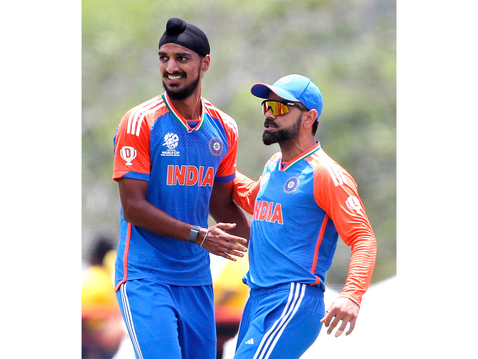 Arshdeep Singh and Virat Kohli (Photo/ANI)