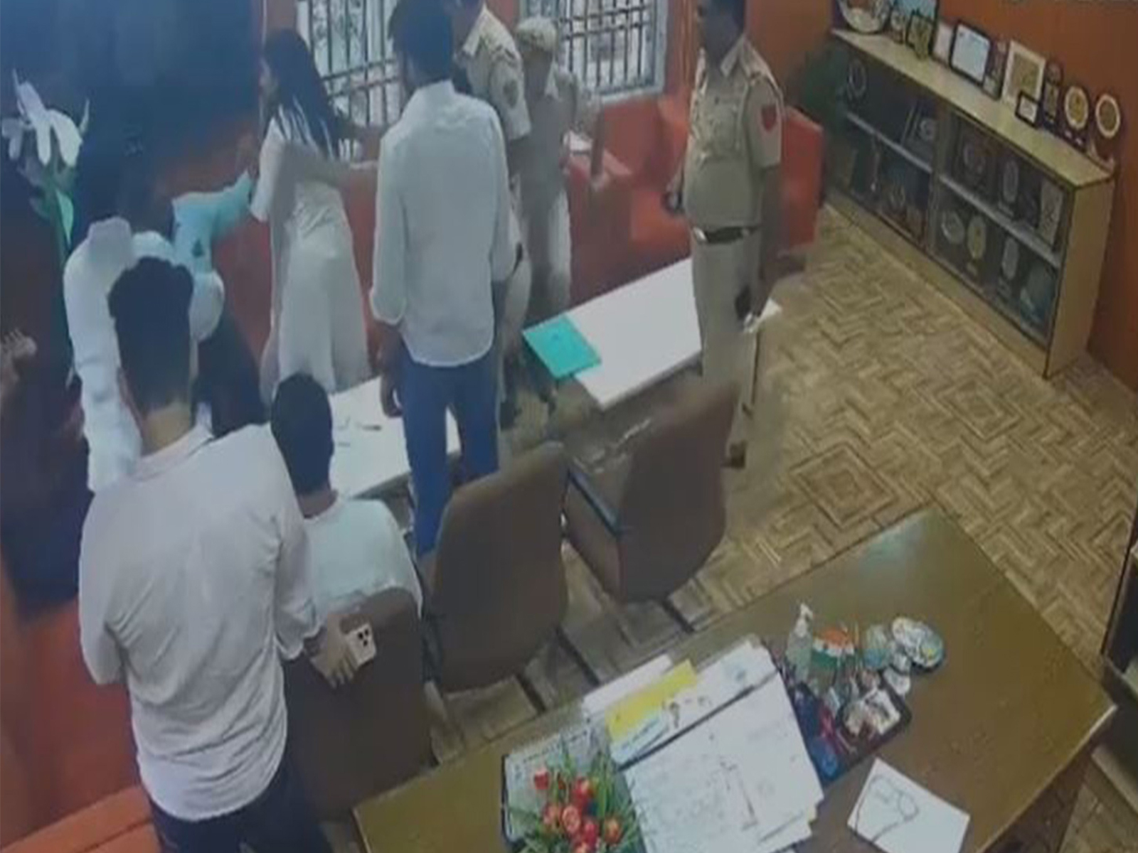 CCTV still of DUSU Joint Secretary Deepika Jha slapping Professor Sujit Kumar (File Photo/Ambedkar College)