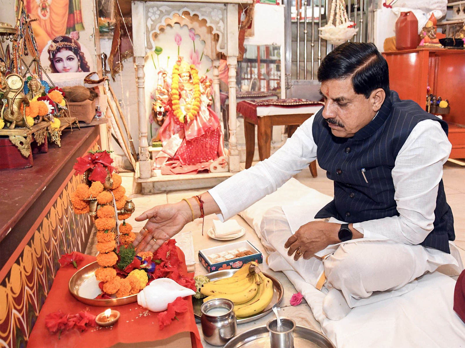 Mohan Yadav offers prayers on occasion of Dhanteras at his residence, in Bhopal. (Photo/ANI)