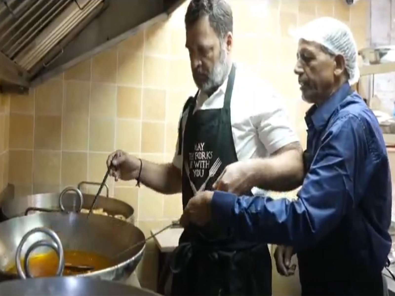 Rahul Gandhi makes Imarti and besan laddus at Delhi's Ghantewala sweet shop (Photo: x/@RahulGandhi)