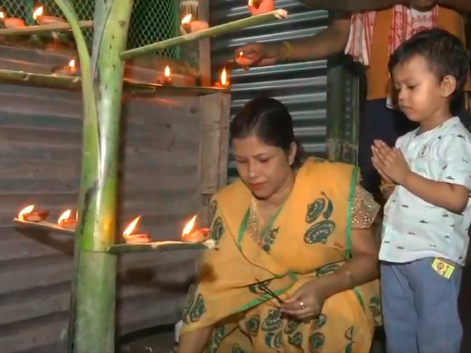People in Guwahati celebrate Diwali by paying tributes to singer Zubeen Garg (Photo/ANI)