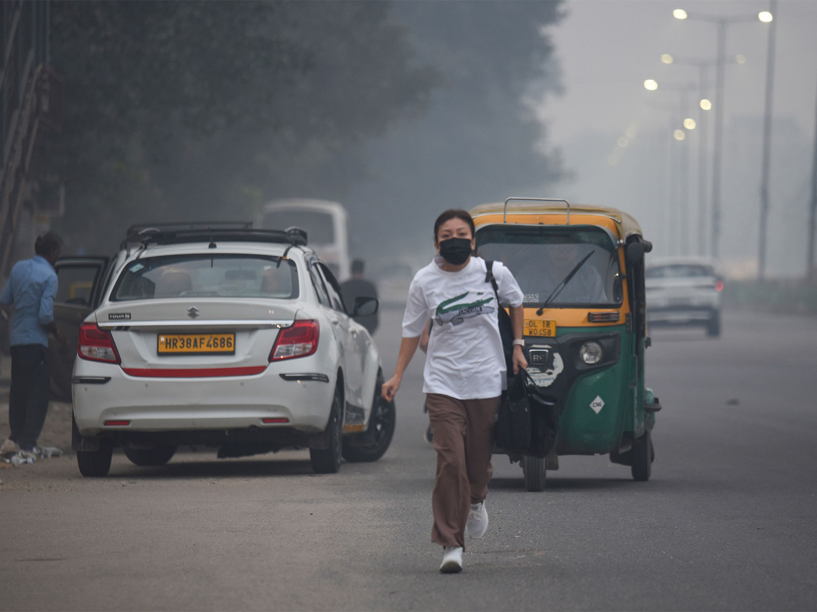 Commuters travel on the Ring Road area as the air quality in the national capital deteriorates to the 'Very Poor' category (Photo/ANI)