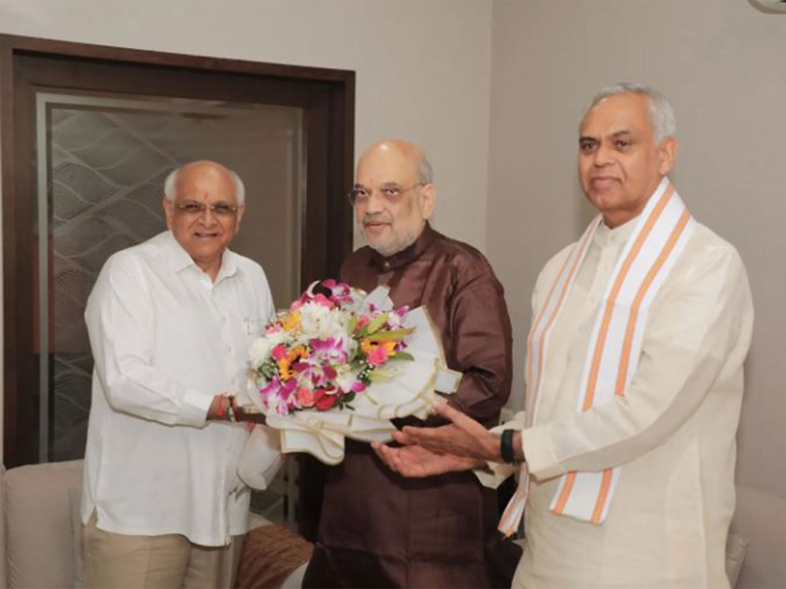 Gujarat Governor Acharya Devvrat, CM Bhupendra Patel visit Amit Shah on his 61st birthday (Photo/ANI)
