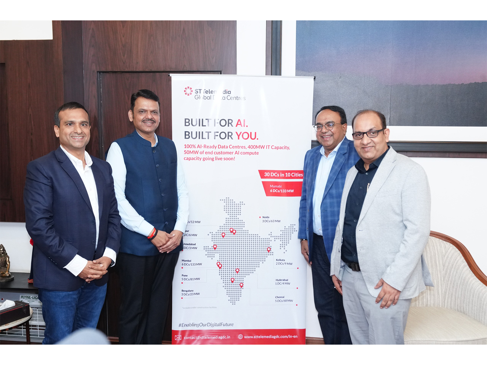 From left to right: Mr. Bimal, CEO, STT GDC India; Mr. Fadnavis, Hon'ble CM of Maharashtra; Mr. Bruno, President and Group CEO, STT GDC; and Mr. Lalit, COO, STT GDC India