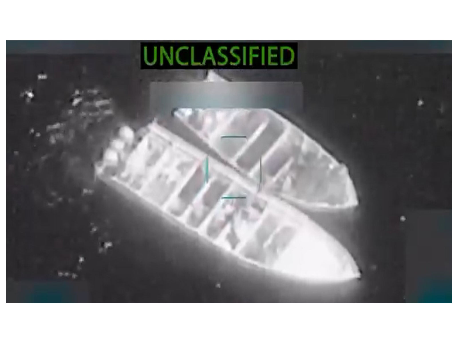 This screengrab taken from a video posted by War Secretary Pete Hegseth shows two boats shortly before they are struck by a missile in the eastern Pacific Ocean (Photo/X@SecWar)