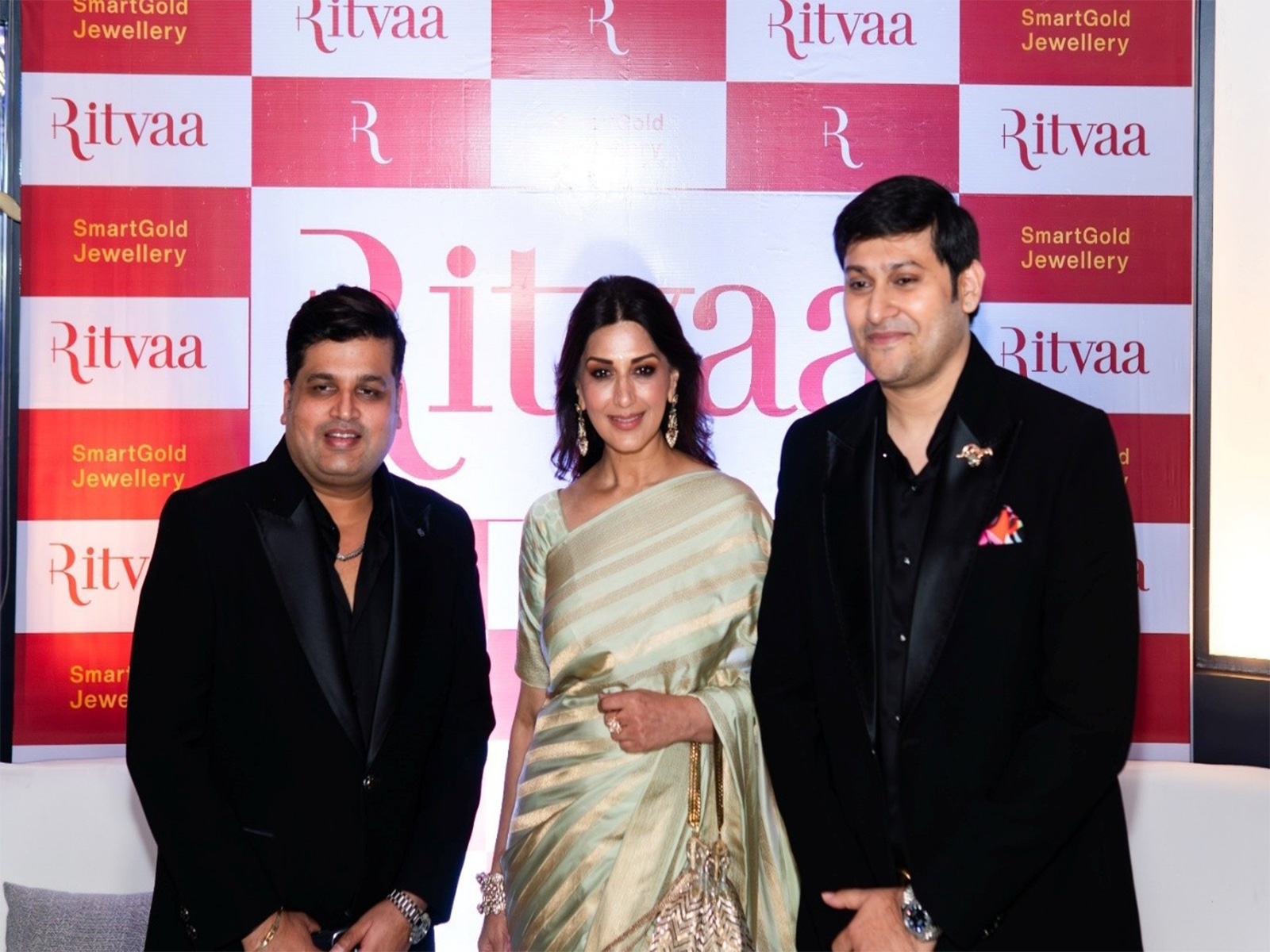 Founders Amit Lalit Jaain and Hanissh Kanakraj Jaain unveiling Ritvaa SmartGold Mangalsutra with Sonali Bendre