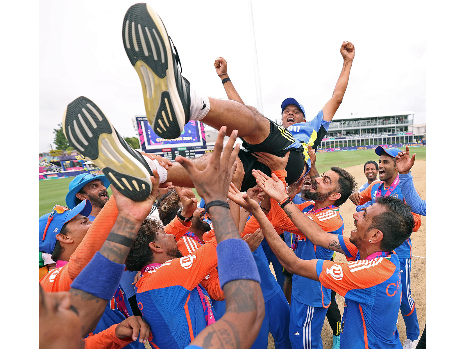Rahul Dravid being lifted by his team after T20 WC win. (Photo: ANI)