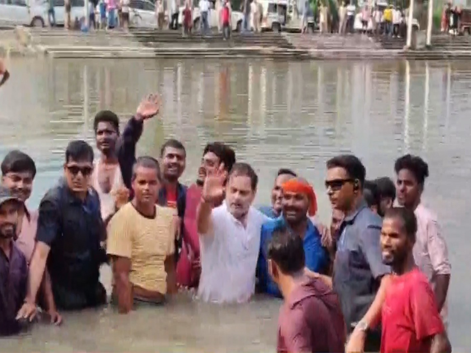 Rahul Gandhi participates in traditional fish-catching process. (Photo/ANI)