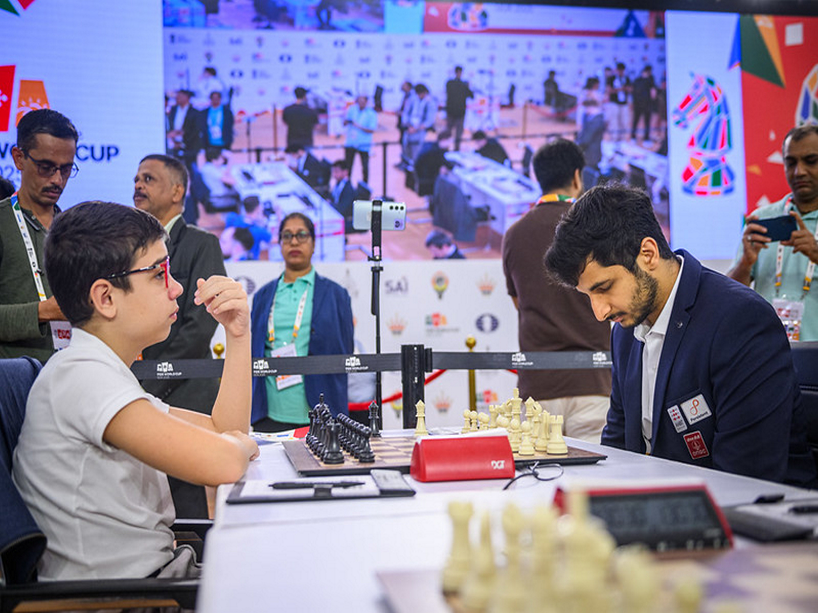 Faustino Oro and Vidit Gujrathi (Photo: Michal Walusza/FIDE)