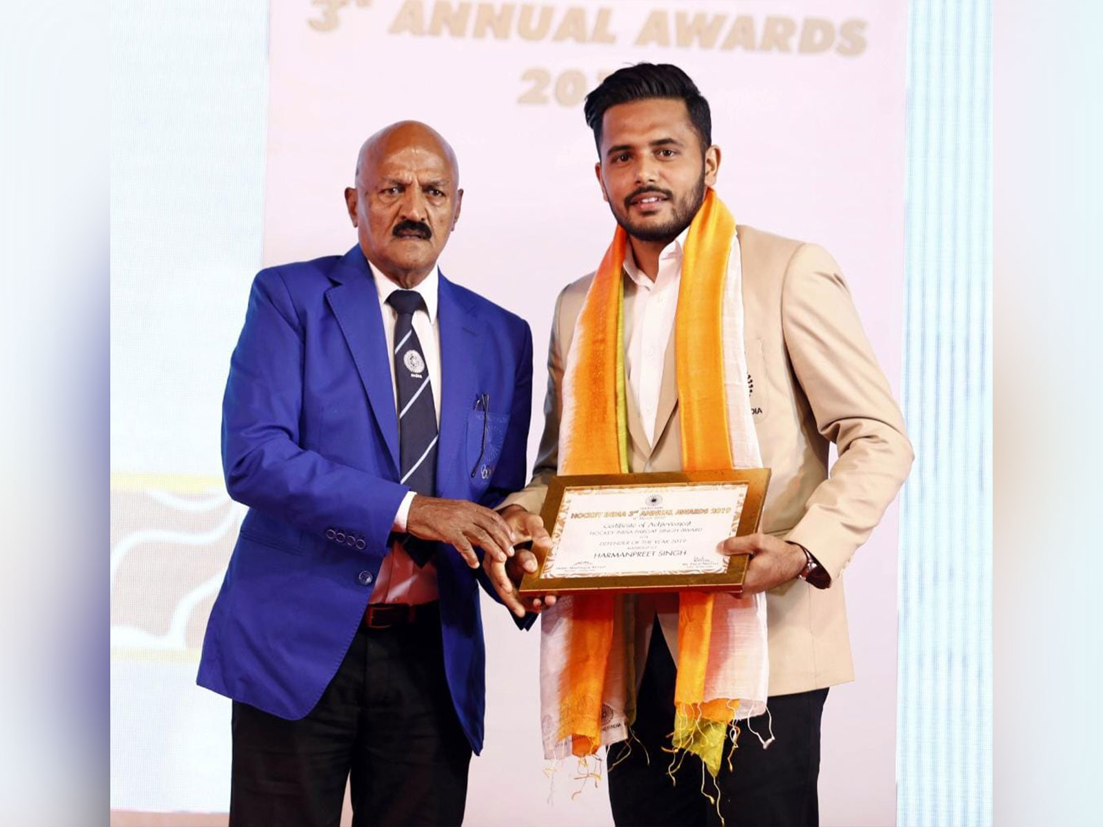 BP Govinda with current Indian captain Harmanpreet Singh. (Photo: Hockey India)