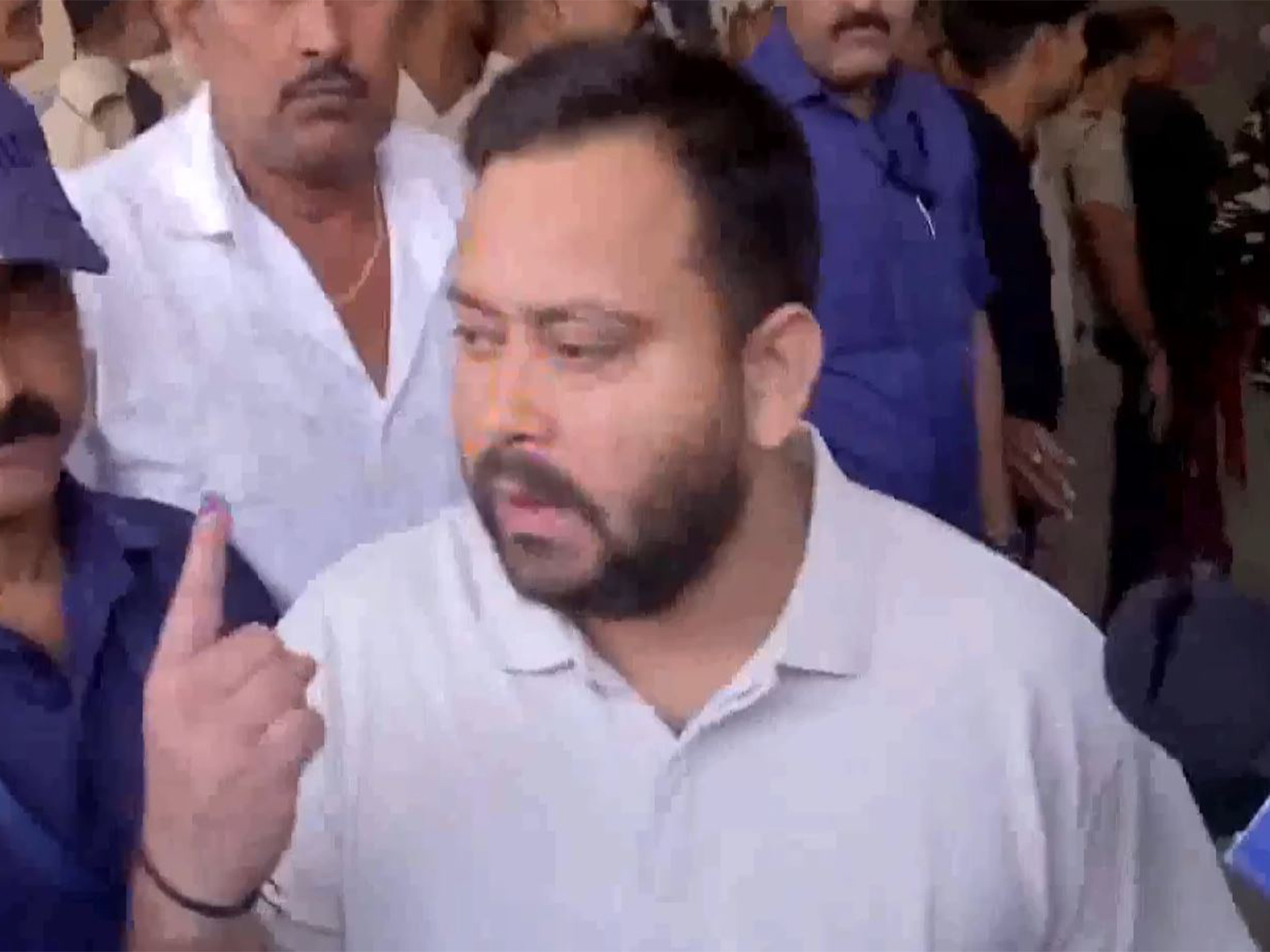 Tejashwi Yadav after casting his vote (Photo/ANI)