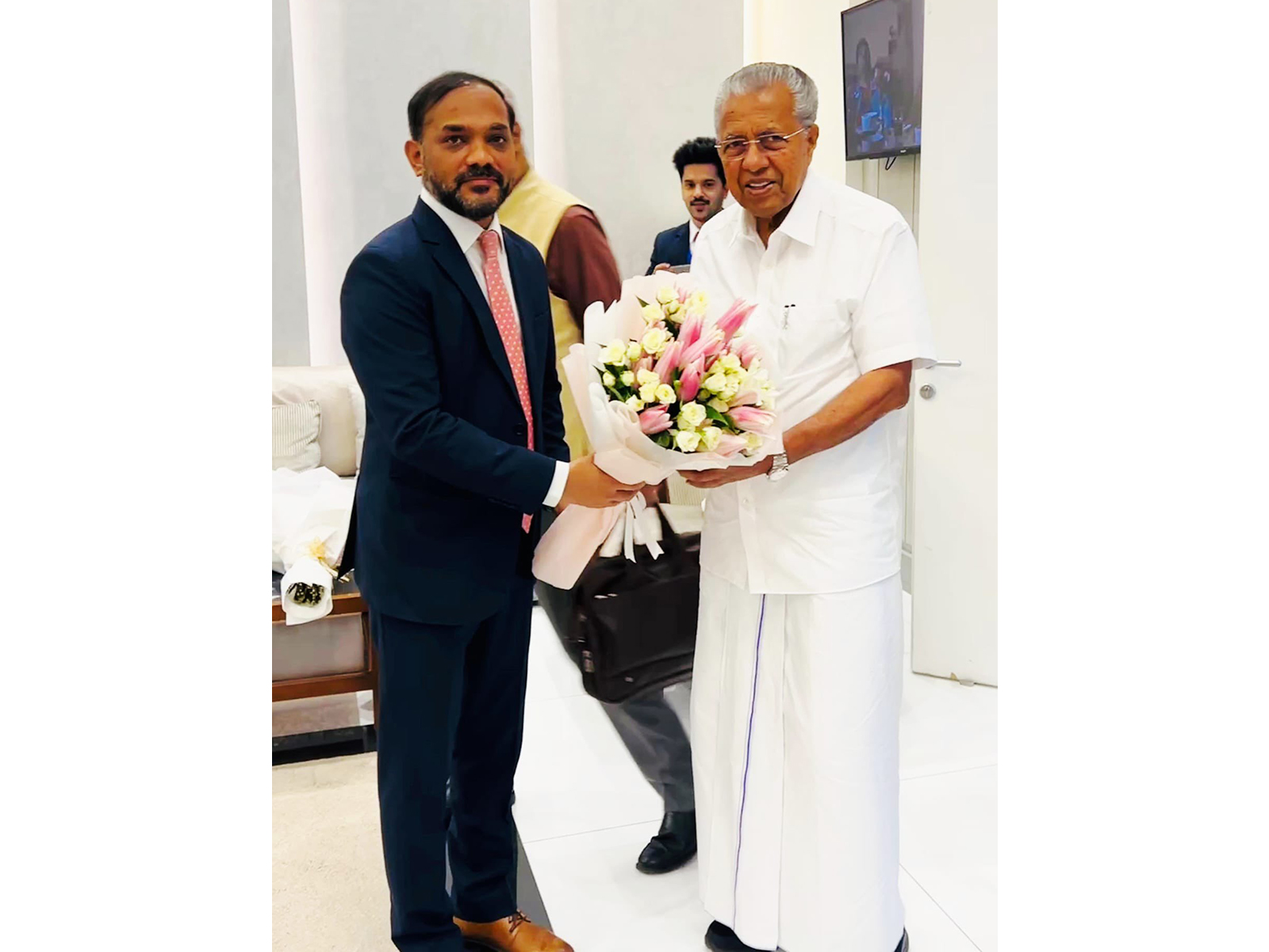 Kerala Chief Minister Pinarayi Vijayan with Charge d'affaires Sanjay K. Muluka (Photo: X@indembkwt)