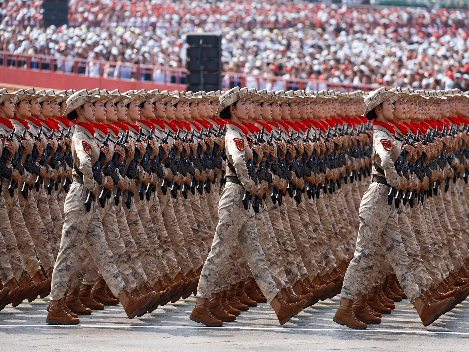 Chinese militia members march during a military parade in Beijing on September 3. (Photo/Reuters)