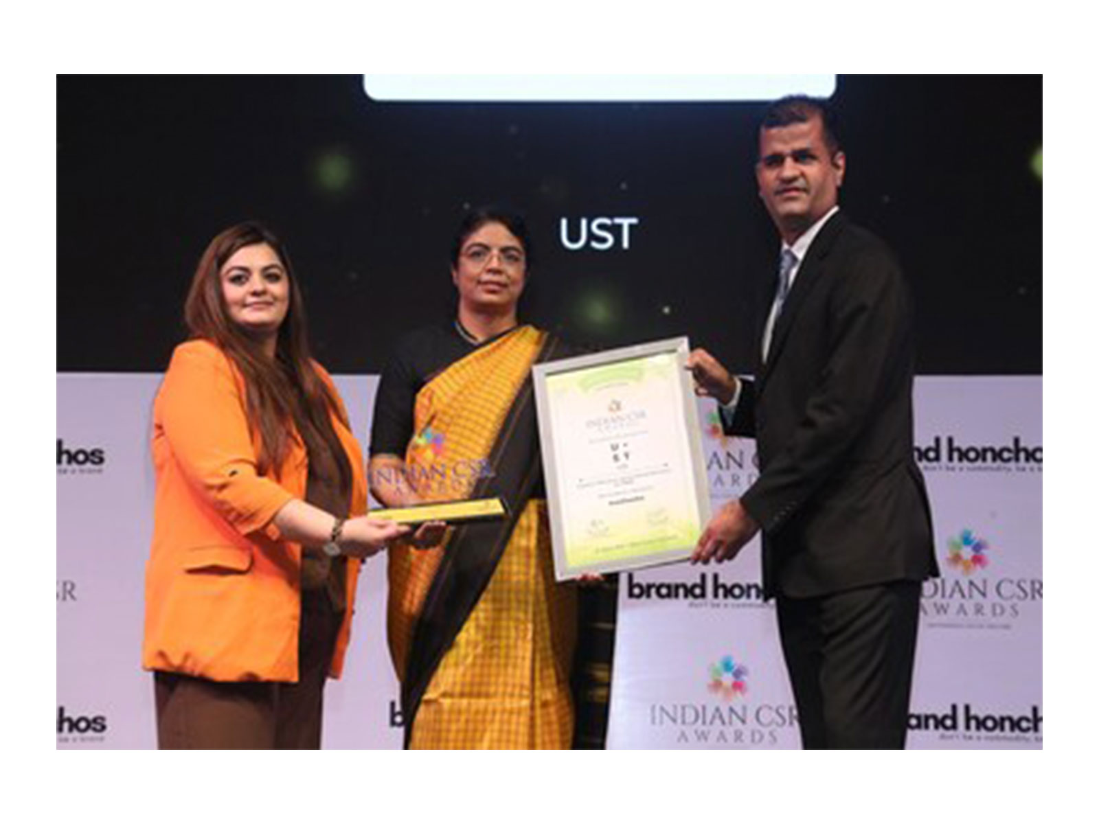 Smita Sharma, Global Program Manager - CSR, UST, receives the India CSR Award