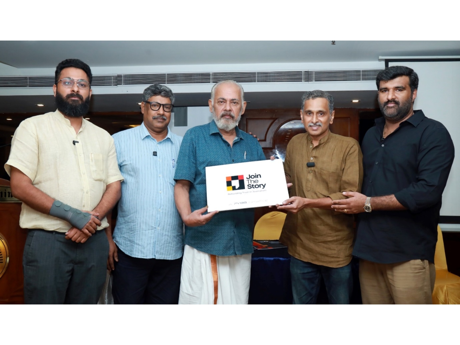 Dr. Sebastian Paul, former Press Council of India member, unveiled the logo of the new media venture 'Join the Story' in the presence of directors Kiran James, MP Basheer, Rajeev Shankaran, Alan John. (Left to right).