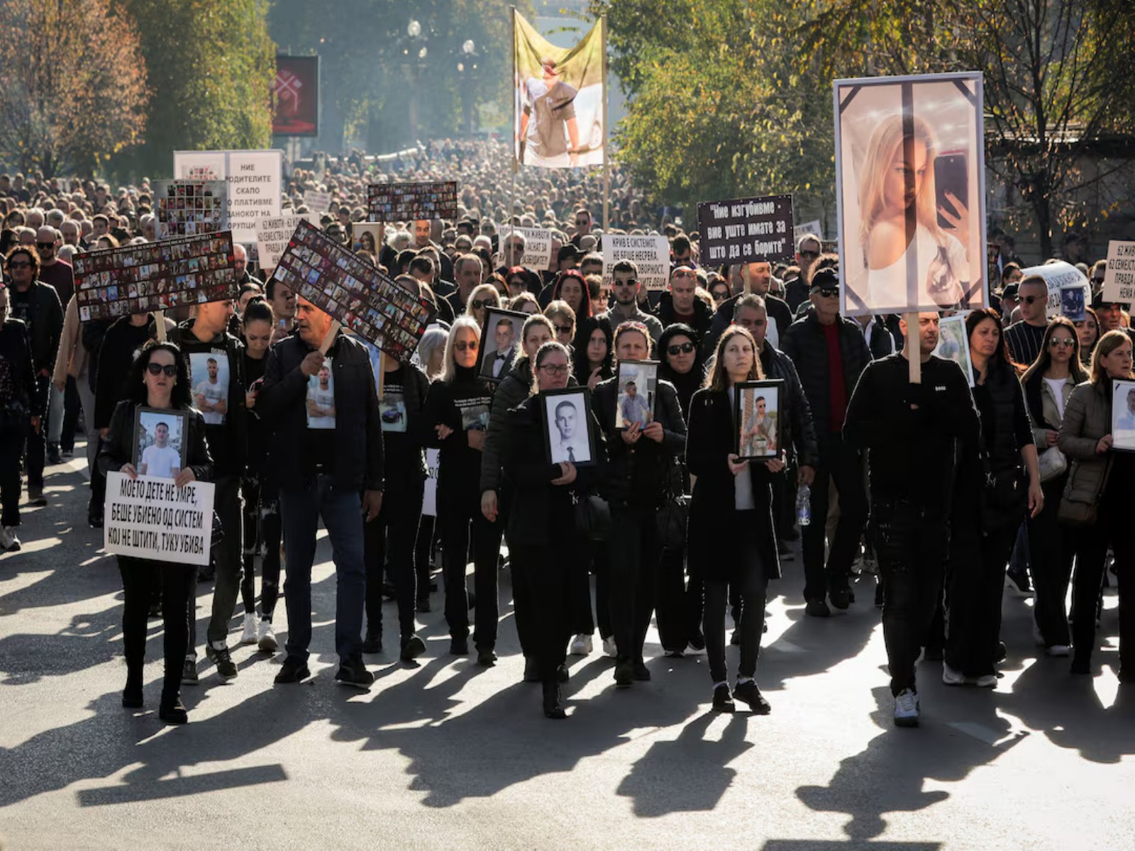 Families of victims of the Pulse nightclub fire take part in the "Angels March" protest in Skopje, North Macedonia. (Photo/Reuters)