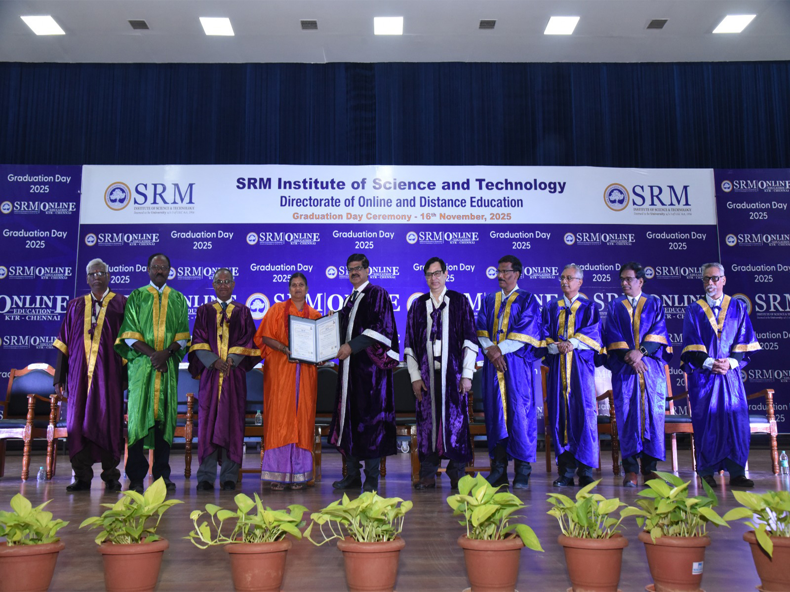 A rank holder is presented with the degree certificate in the presence of distinguished dignitaries during the SRMIST Graduation Day ceremony.