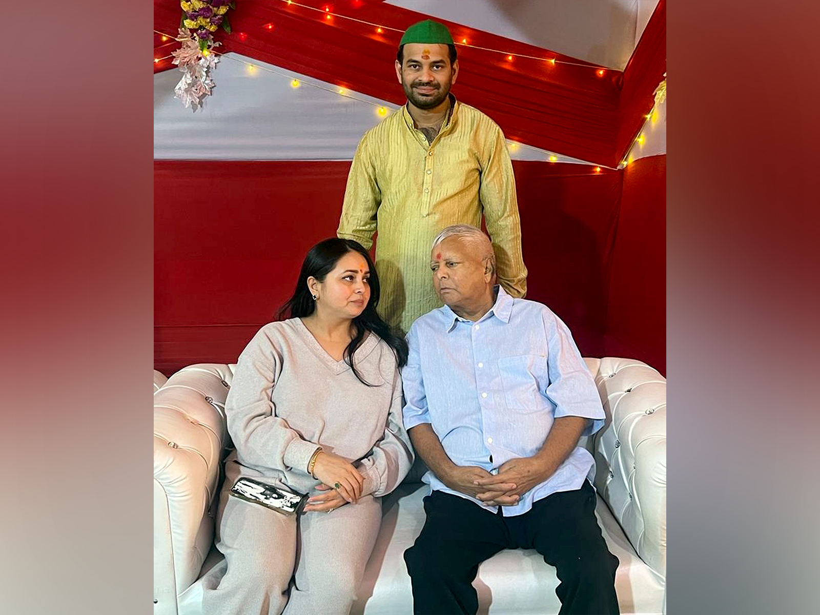 Lalu Prasad Yadav with his daughter Rohini Yadav and his estranged son Tej Pratap Yadav. (Photo/ANI)