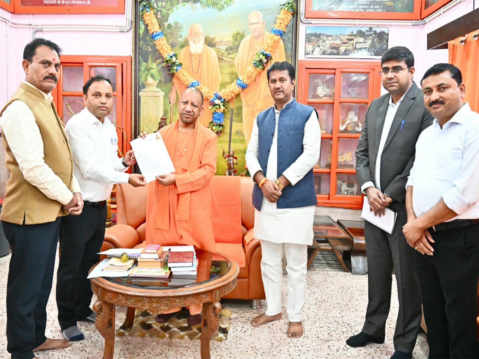 UP CM Yogi Adityanath fills out the enumeration form for the SIR (Photo/Gorakhnath Temple Administration)