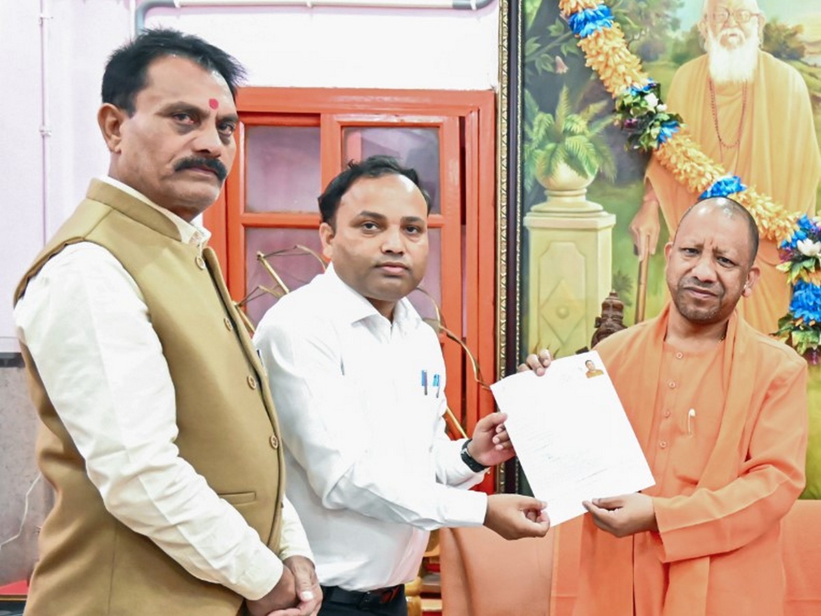 Uttar Pradesh CM Yogi Adityanath fills enumeration form under Special Intensive Revision (Photo/ANI)