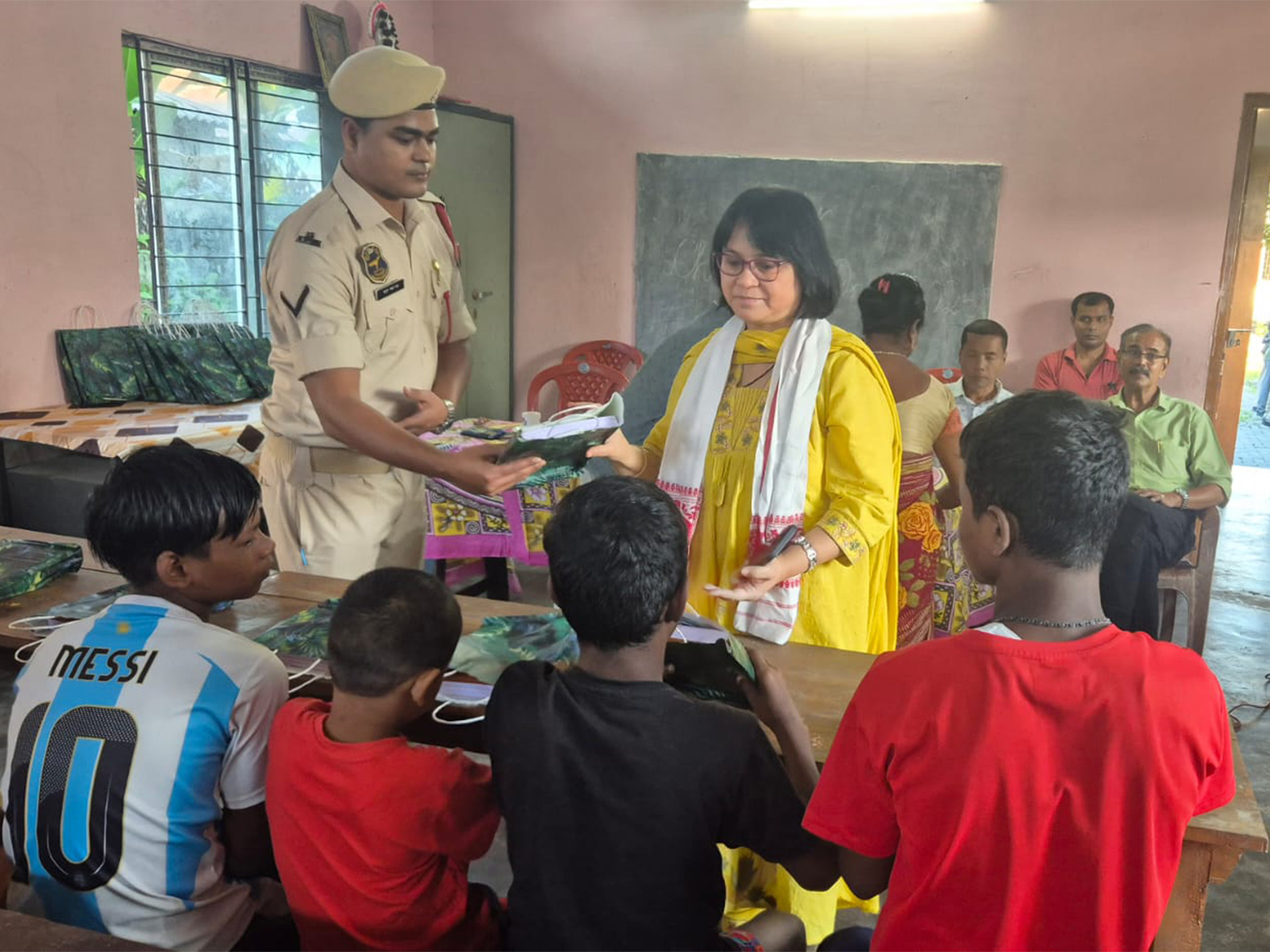 Assam Police officers reach out to children in care homes (Photo/ANI)
