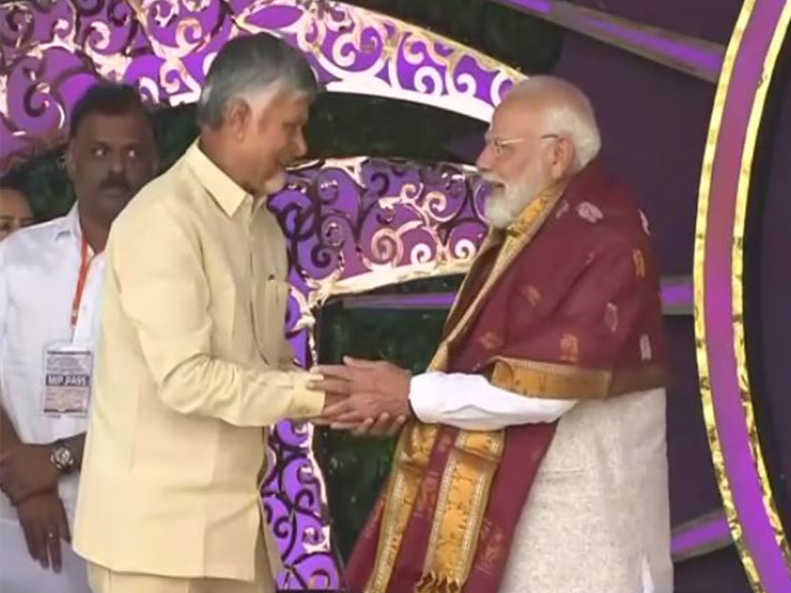 Andhra Pradesh CM N Chandrababu Naidu with PM Modi  in Puttaparthi (Photo/ANI)