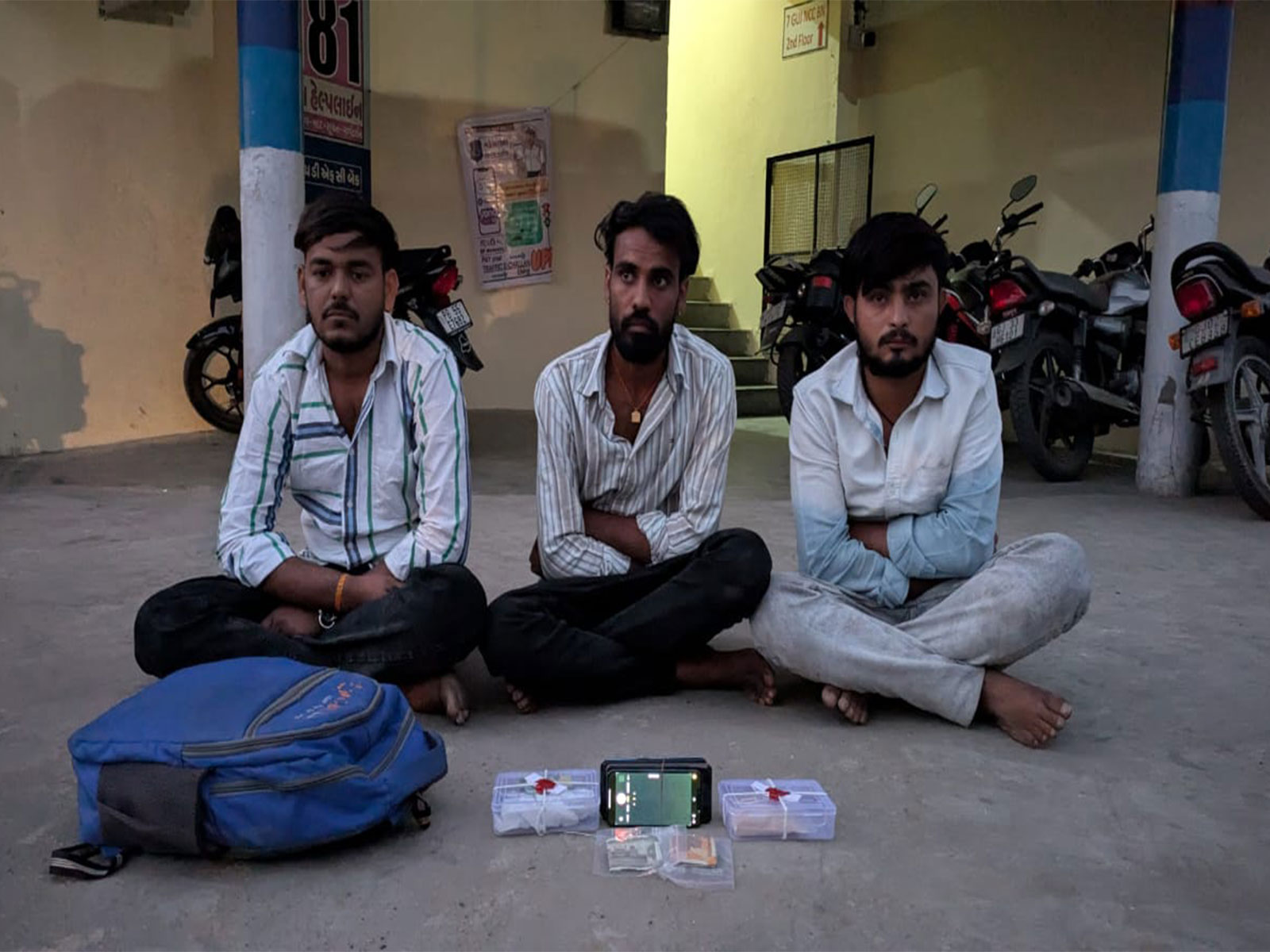 Accused Ashok Bhakhararam Bishnoi, Jagdish Hariram Bishnoi and Suresh Viraram Bishnoi with seized Mudammal in Mehsana (Photo/ANI)