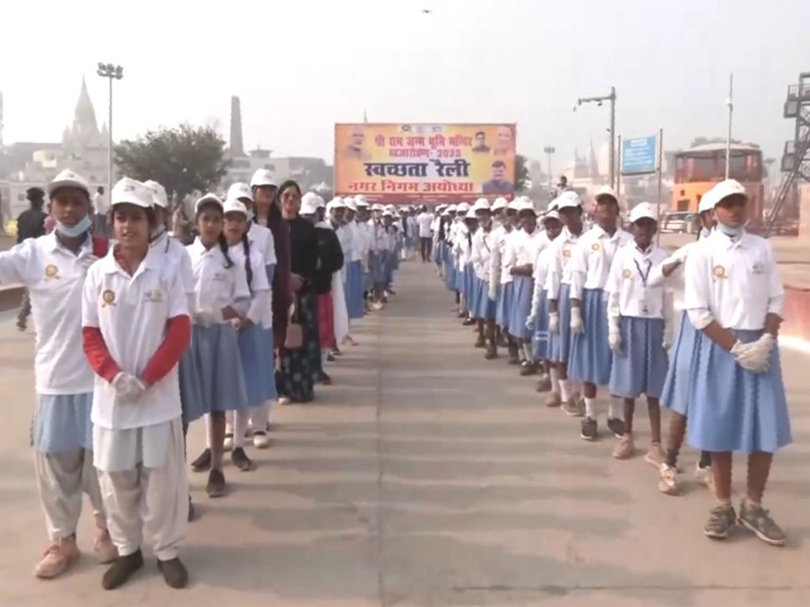 Children of Ayodhya during the cleanliness drive organised by municipal corporation ahead of 'Dhawjarohan' programme. (Photo/ANI)