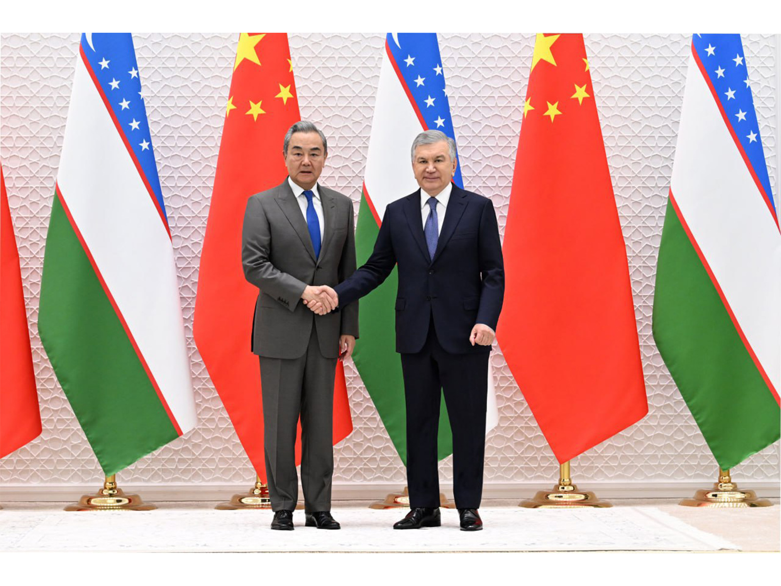 Uzbekistan's President Shavkat Mirziyoyev and China's Foreign Minister Wang Yi  (Photo/@president_uz)