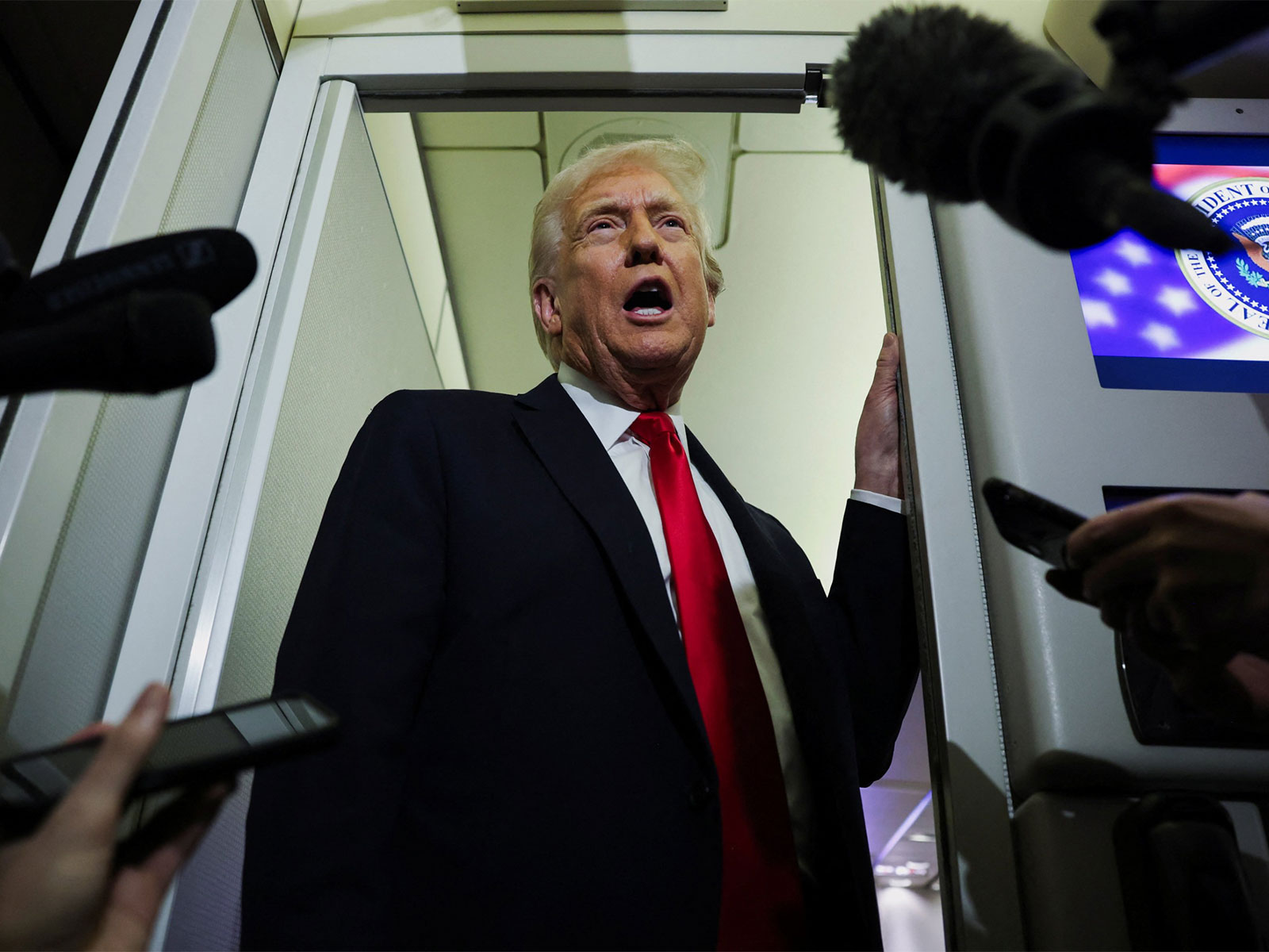 US President Donald Trump onboard Air Force One (Photo/ Reuters)