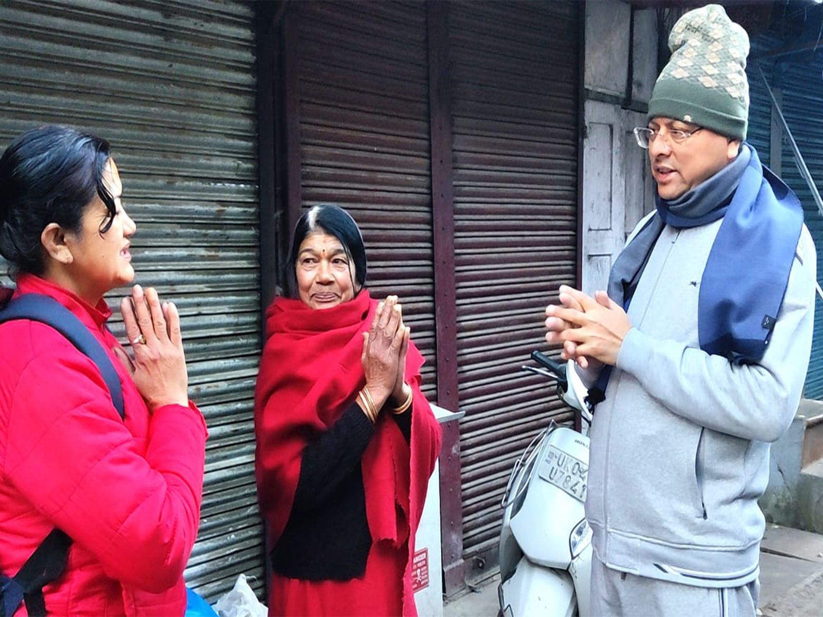 Uttarakhand CM Pushkar Singh Dhami interacts with local residents in Nainital (Photo/ANI)
