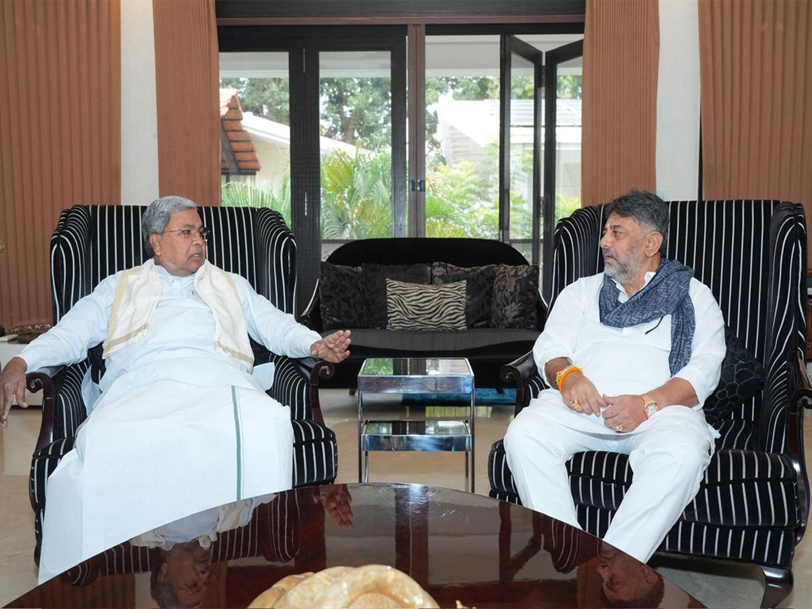 CM Siddaramaiah with DK Shivakumar at his residence (Photo/DCM Office)