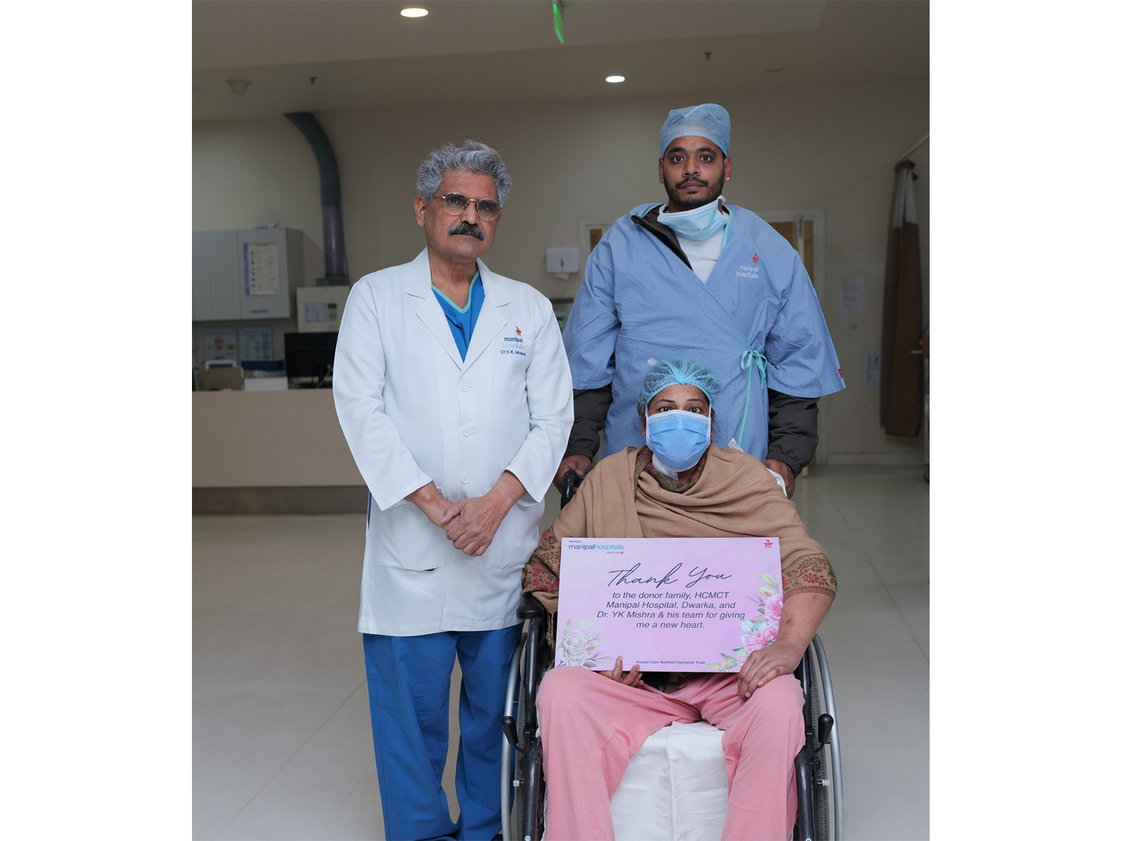 Dr. Yugal Kishore Mishra and Viji Varghese with the patient in Delhi. (Photo/ANI)