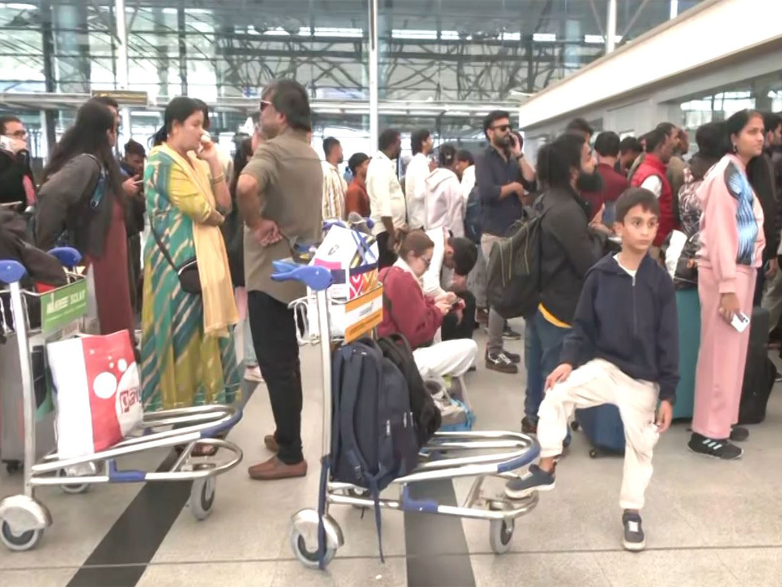 Stranded Passengers outside an Airport (Photo/ANI) 