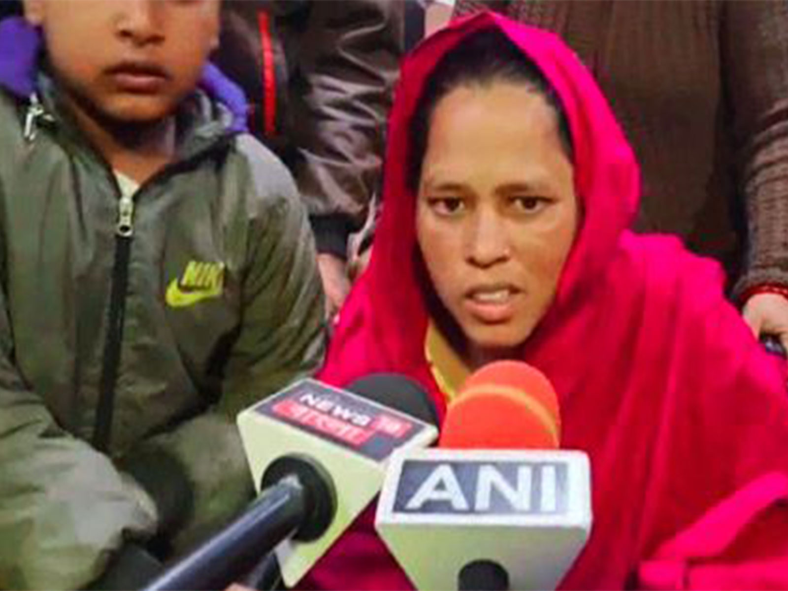 Sunali Khatun with her 8-year-old son (Photo/ANI)