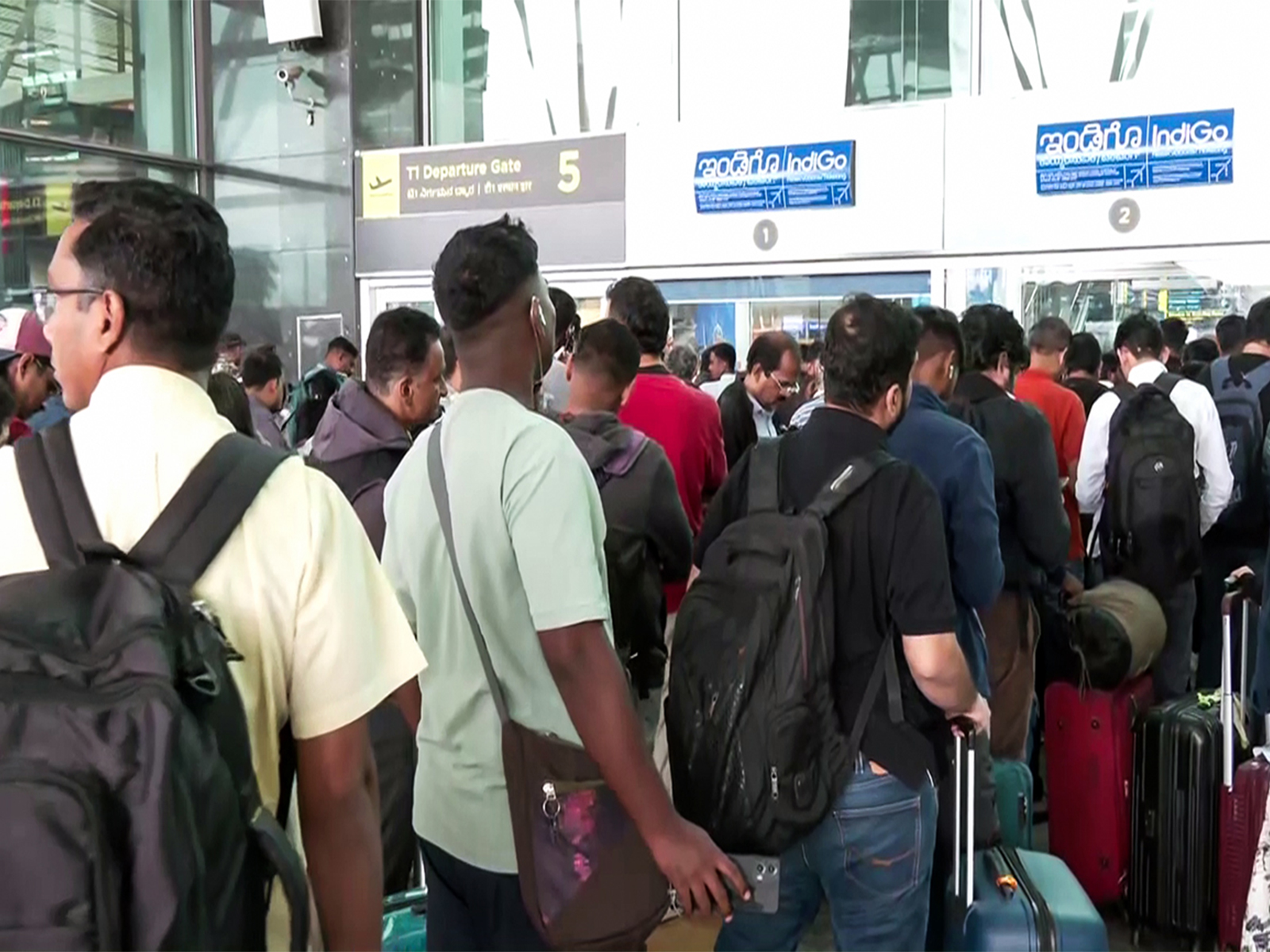 Stranded Passengers outside an Airport (Photo/ANI)