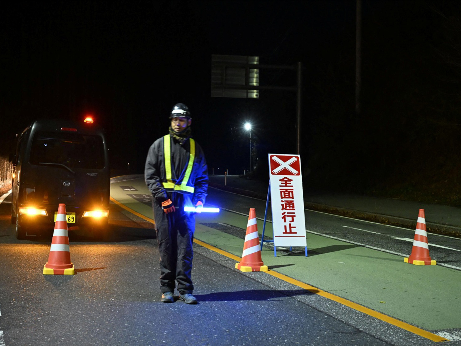 Traffic is restricted on a road following the issuance of a tsunami warning in Iwate Prefecture, Japan (Photo/ Reuters via Kyodo News)